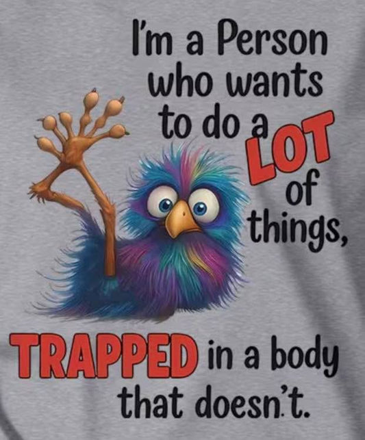 Trapped in a body that doesn’t care T-shirt